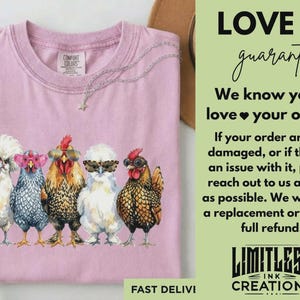 May include: A light pink crew neck t-shirt featuring a graphic of five chickens wearing various styles of sunglasses. The shirt has a Comfort Colors label at the inner neckline. The text on the right side reads LOVE IT guarantee, We know you&rsquo;ll love your order!, and LIMITLESS INK CREATIONS.