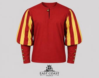 May include: Red tunic with yellow striped sleeves. The long sleeves have gold-colored buttons at the wrist. The tunic has a small opening at the neckline and a gold-colored button. The East Coast Vikings logo is at the bottom.