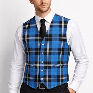 May include: A blue tartan waistcoat with black and white checks. The waistcoat is worn over a white shirt and black tie. The person is also wearing black trousers and a black belt. The waistcoat has a button-down front.