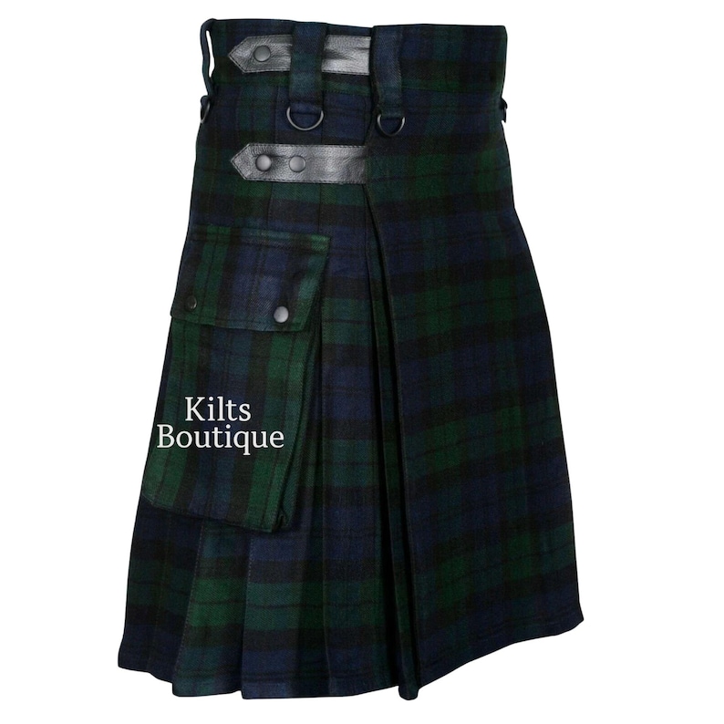 May include: A traditional kilt in a green and navy blue plaid pattern. The kilt features a pocket, leather straps, and the text "Kilts Boutique". The garment is designed with pleats and a belt, showcasing classic Scottish attire.