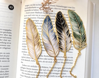 Feather-shaped bookmark with gold accents, made of high-quality metal with a delicate feather charm | available in gold, black, blue, and green