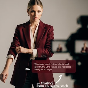May include: A woman in a burgundy blazer and white blouse, with black trousers, stands in front of a camera. Text on the image reads "She gave me structure, clarity, and growth. My DMs turned into real sales after just 30 days!" and "Feedback from a business coach."