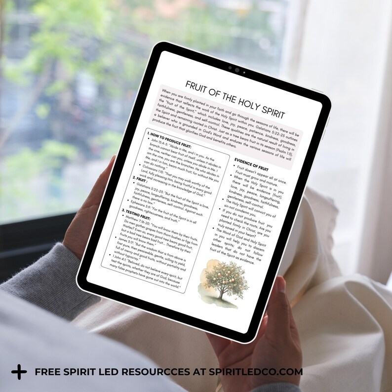 May include: A tablet shows a document titled "Fruit of the Holy Spirit." The document contains text about faith and goodness, with a tree graphic. The tablet is held by a person.
