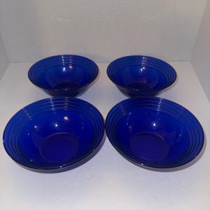 4 RARE vintage COBALT BLUE glass 5.5 inch diameter and 2.0 inches tall. Ribbed edge fruit bowl