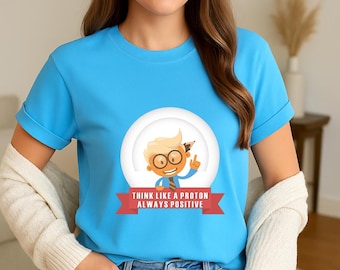 ポジティブマインドセットTシャツ | おもしろ科学Tシャツ | オタク向け物理学ギフト | オタクモチベーションTシャツ | 陽子のように考えるTシャツ