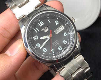 Vintage Seiko 6602-7040 Manual Winding 17 Jewels Black Dial Japan