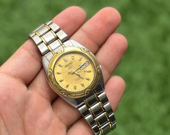 Montre automatique Seiko vintage : cadran doré bicolore, jour-date