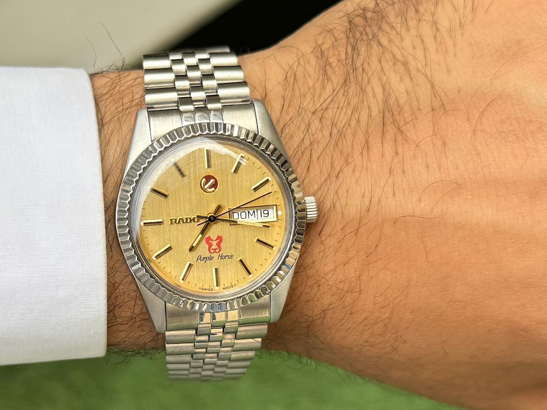 Vintage Rado Purple Horse Automatic Watch: Golden Dial, 25 Jewels