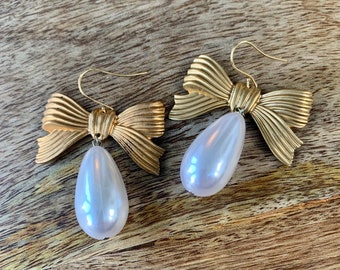 Brass and pearl bow drops