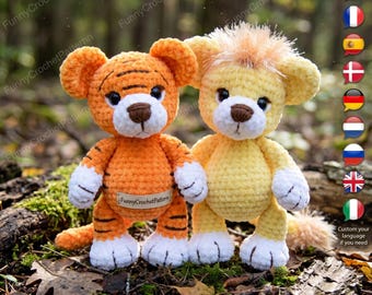 May include: Two handmade crochet stuffed animals: an orange tiger with black stripes and a yellow lion. Both have white paws and brown noses. The tiger has the text "FunnyCrochetPattern" on a tag. They are set against a blurred forest background.