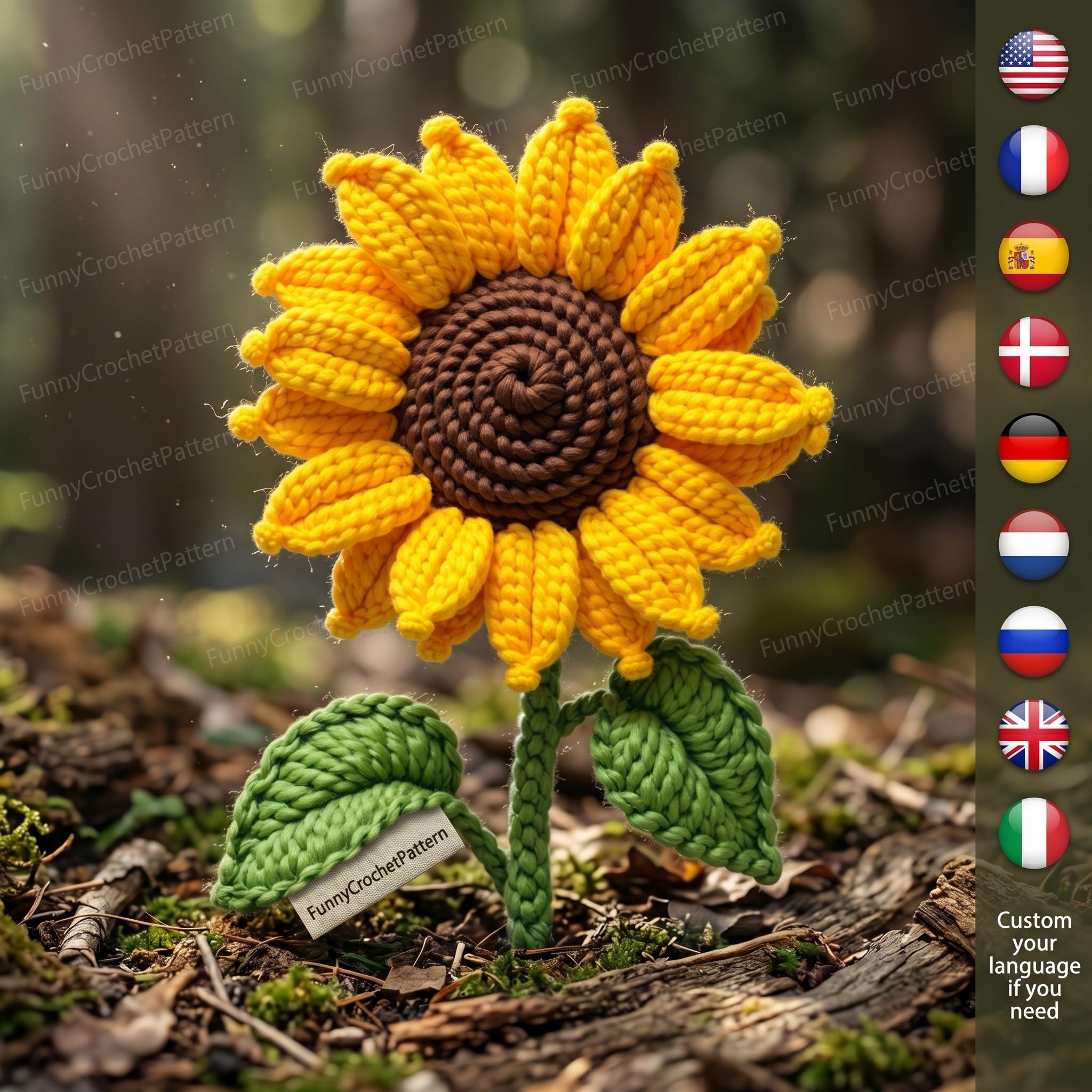 Op de afbeelding: Een handgemaakte gehaakte zonnebloem met gele bloemblaadjes en een bruin hart. De stengel en bladeren zijn groen. De tekst "FunnyCrochetPattern" staat op een klein label aan de stengel. De zonnebloem staat tegen een vage natuurlijke achtergrond.