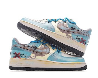 Zapatillas AF1 pintadas a mano: Air Force 1 con grafiti personalizado y diseño de Swoosh con goteo, zapatillas urbanas blancas y negras.