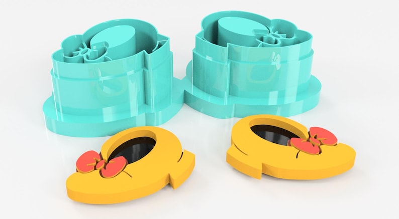 May include: Two teal cookie cutters and two yellow shoe-shaped cookie cutters with red bows. The cookie cutters are designed to create shoe-shaped cookies, perfect for themed baking projects. The image is on a white background.