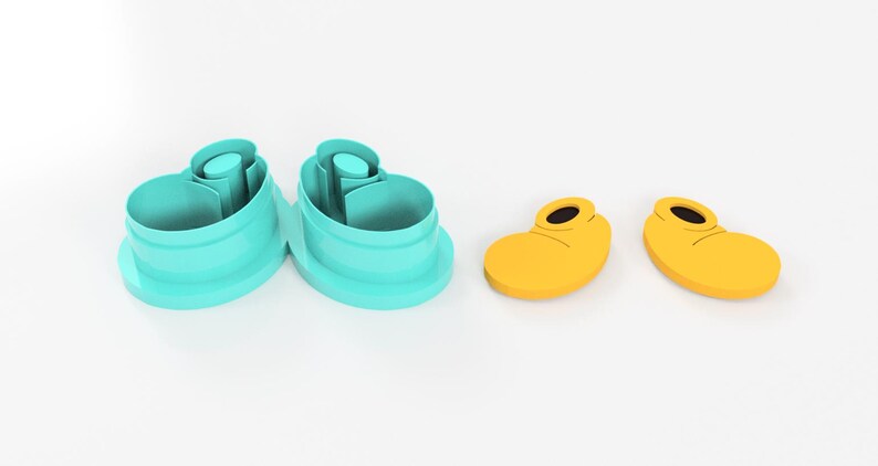 May include: A set of two teal shoe-shaped cookie cutters and two yellow shoe-shaped cookie cutters with black details. The cutters are designed to create whimsical treats.