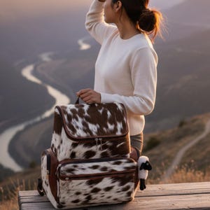 leather backpack carry-on

cowhide hair-on backpack

leather rucksack travel bag

diaper bag for moms

leather diaper backpack

cowhide leather shoulder bag

overnight leather gym bag

weekend travel rucksack

handmade cowhide mother gift

hair-on-hide carry-on bag

boho cowhide diaper bag

leather gym and travel bag

luxury leather mom gift

cowhide leather overnight bag