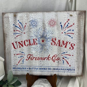 Uncle Sam’s Firework Co. Sign – 11”x14” Patriotic Crackle MDF Wall Art – Vintage 4th of July Fireworks Display Decor
