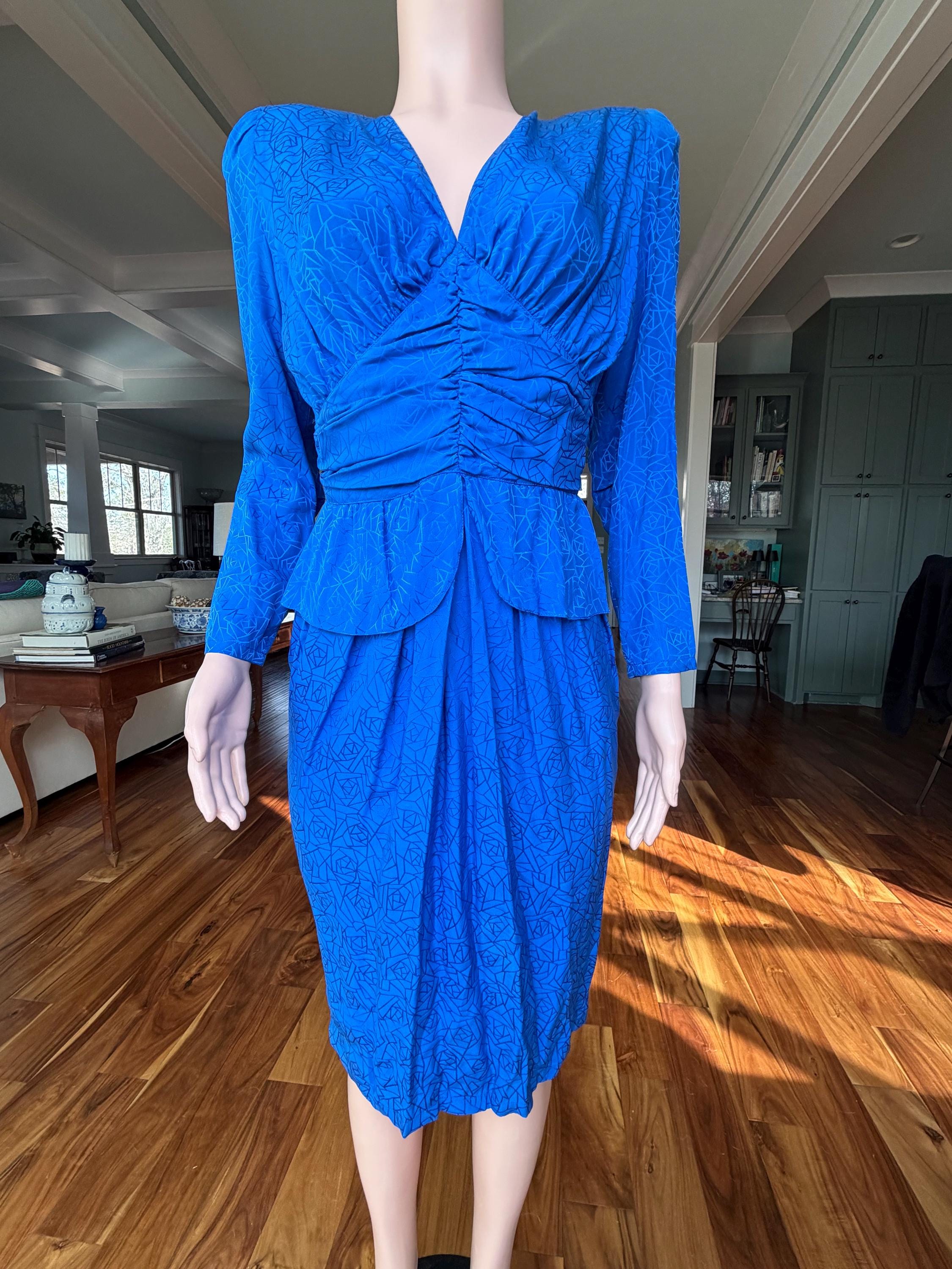 blue sheer long sleeve dress Shop the Lucia Sheer Sleeve Ruched Mini Dress in Light Blue main image 0