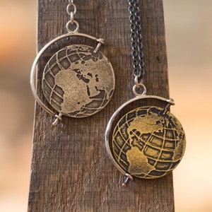 Spinning globe, spinning world necklace