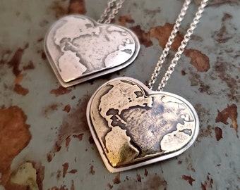 World Heart necklace in silver or brass and silver