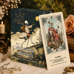 May include: A Bone Garden Tarot Deck box and a single card titled The Emperor. The box features a skeleton walking with a dog under a starry sky. The card depicts a skeleton king on a throne with the text: Built an empire just for the aesthetic. Rules with a soft glare and passive-aggressive structure. Authority, order, flower-powered control.