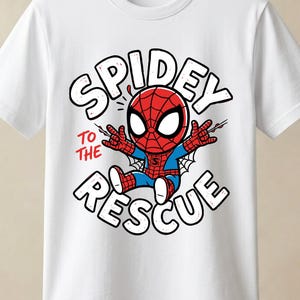 May include: A white short-sleeved t-shirt featuring a graphic of a cartoon Spider-Man character in red and blue. The text "SPIDEY TO THE RESCUE" is printed in large black letters around the character, with the words "TO THE" in red.
