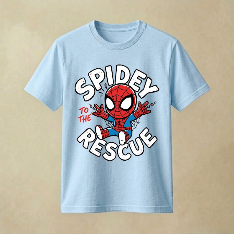 May include: A light blue short-sleeve t-shirt featuring a graphic of a cartoon Spider-Man character in the center. The text "SPIDEY TO THE RESCUE" is printed in white and red around the character, who is shown with web-shooting hands.