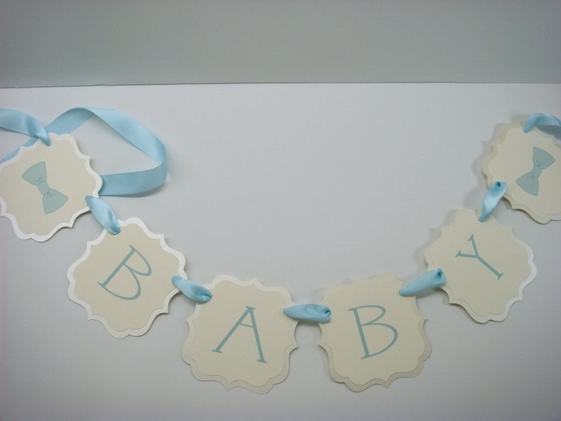 Baby Bow-Tie Boy Theme Shower Banner Decoration Prepared in Colors to Coordinate with Your Baby Shower Color Palette