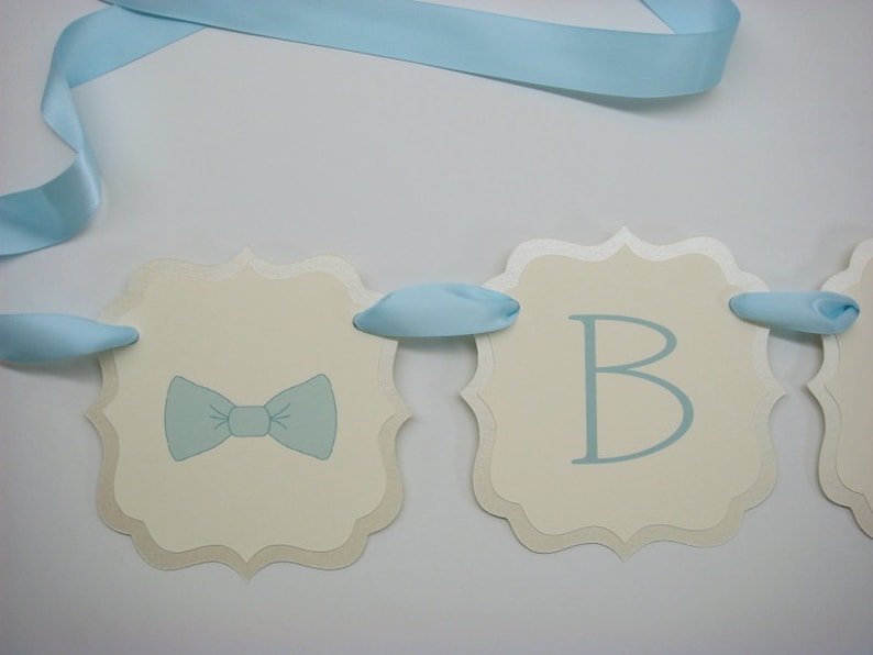 Baby Bow-Tie Boy Theme Shower Banner Decoration Prepared in Colors to Coordinate with Your Baby Shower Color Palette