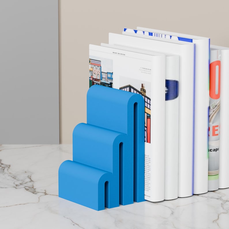 blue bookends with books