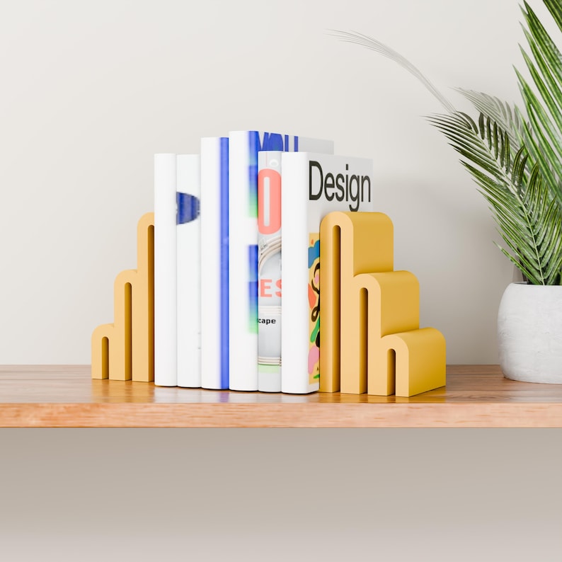 yellow bookends with books