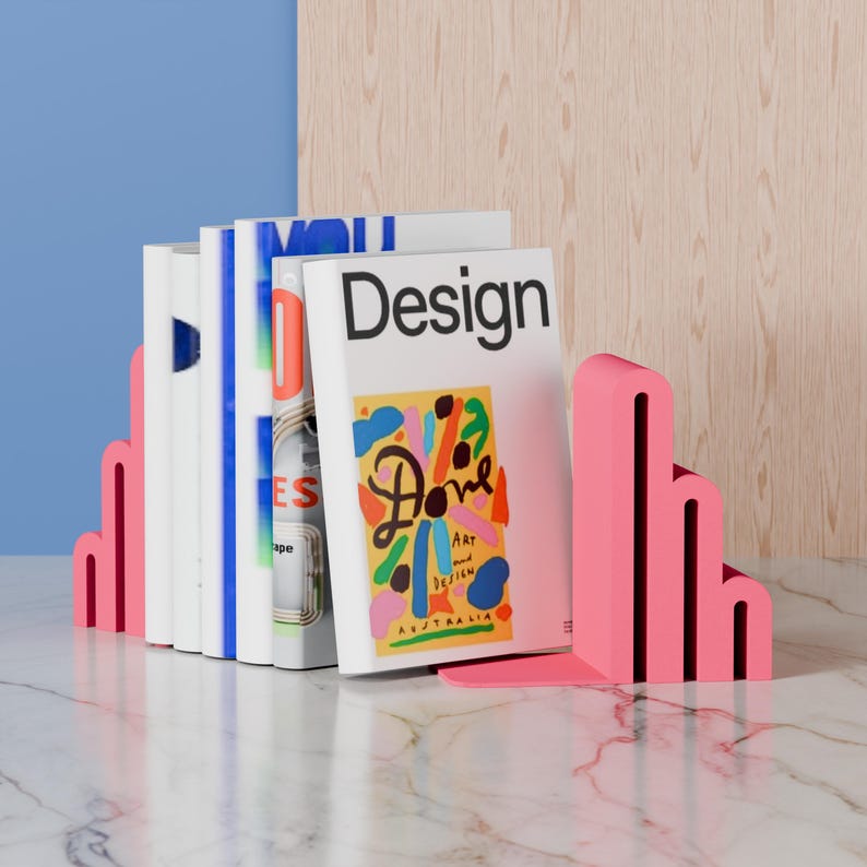 pink bookends with books
