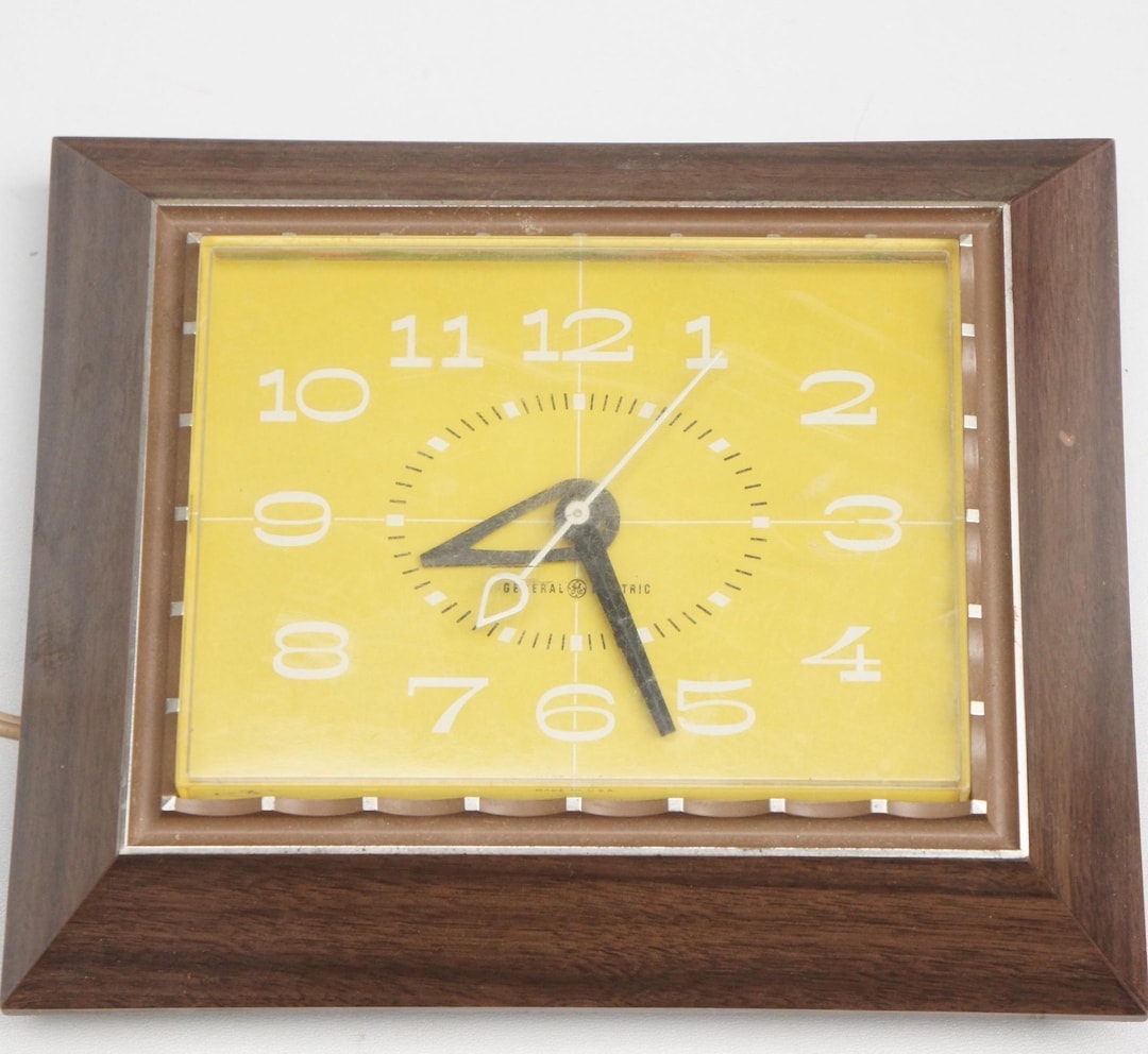 Vintage Mid Century Modern Faux Wood Electric Wall Clock by General ...