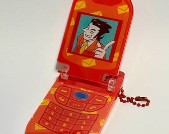 spamtenna matching flip phone charm - Spamton