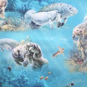 May include: A colorful underwater scene with multiple manatees swimming in a turquoise blue ocean. The manatees are gray and white and have large, flipper-like tails. There are also some small fish and a sea turtle in the image.