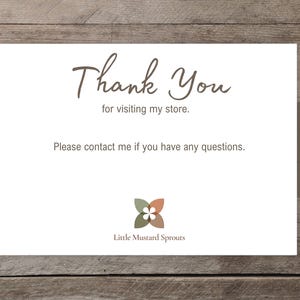 May include: A white rectangular thank you card featuring dark brown text that reads Thank You for visiting my store. Please contact me if you have any questions. At the bottom is a four-leaf clover logo in muted green and orange with the text Little Mustard Sprouts.
