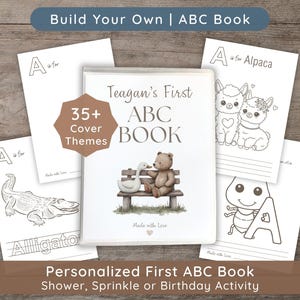 A personalized ABC book with the text "Teagan's First ABC Book" and illustrations of an ant and alligator. The book cover features a teddy bear and a duck on a bench. The image also includes the text "Build Your Own ABC Book" and "Personalized First ABC Book".