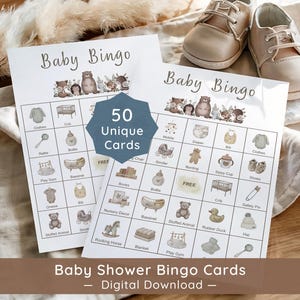May include: Two white Baby Bingo game cards featuring illustrations of woodland animals and baby items. A blue badge in the center reads 50 Unique Cards. The cards include a grid with various baby-themed icons and labels like Crib, Bottle, and Stuffed Animal.