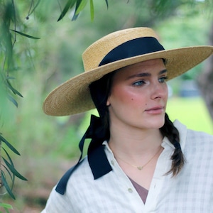 Wide Brimmed Natural Straw Boater Hat with a long chin strap ribbon Amal