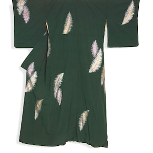 May include: Dark green kimono with a feather pattern. The feathers are embroidered in white, pink, and gold. The kimono has wide sleeves and a wrap-around design, typical of traditional Japanese garments.