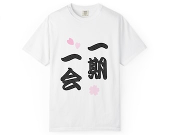 May include: White t-shirt featuring Japanese calligraphy and pink cherry blossom designs. The black characters read "Ichigo-e". A casual, crew neck tee.