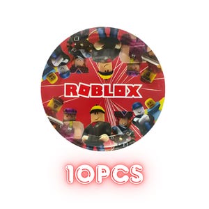 Op de afbeelding: Een rode ronde feestbord met het Roblox-logo in wit en illustraties van Roblox-personages. De tekst "10PCS" wordt onderaan weergegeven in een gloeiend neon-lettertype.