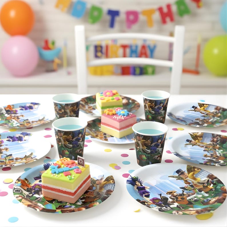 May include: A festive birthday party table setting with plates, cups, and small cakes. The plates and cups feature a colorful cartoon design. Colorful confetti and balloons add to the celebratory atmosphere. A banner spells out "Birthday".