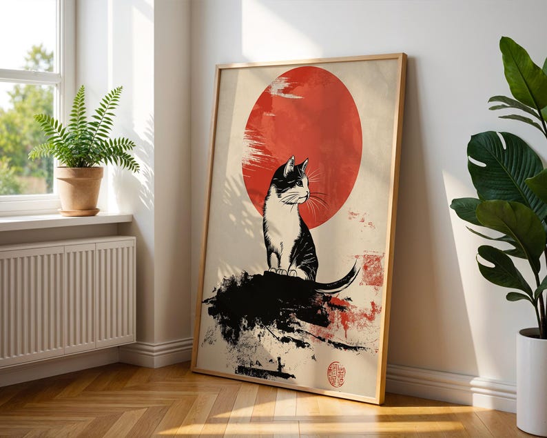 May include: Black and white illustration of a cat sitting on a rock with a red sun behind it. The image is in a Japanese style.