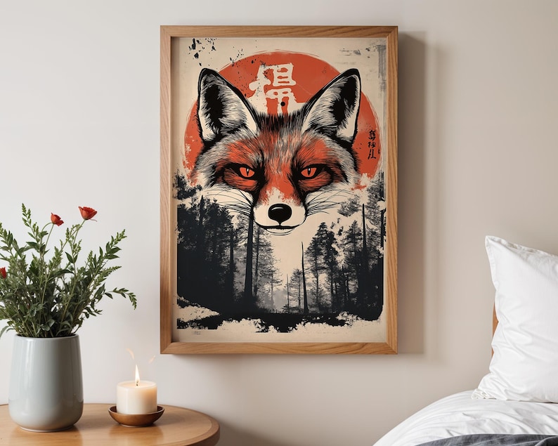 May include: A digital illustration of a red fox with a red sun behind it. The fox is looking directly at the viewer. The background is a dark forest with trees. The Japanese characters "Kitsune" and "狐" are written in white on the sun.