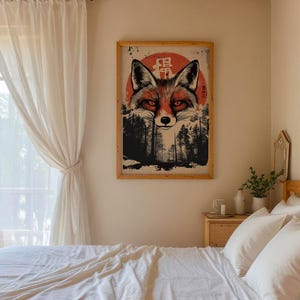 May include: A framed print of a red fox with a red sun behind it. The fox is looking directly at the viewer. The print has Japanese characters on it. The print is hanging on a wall in a bedroom.