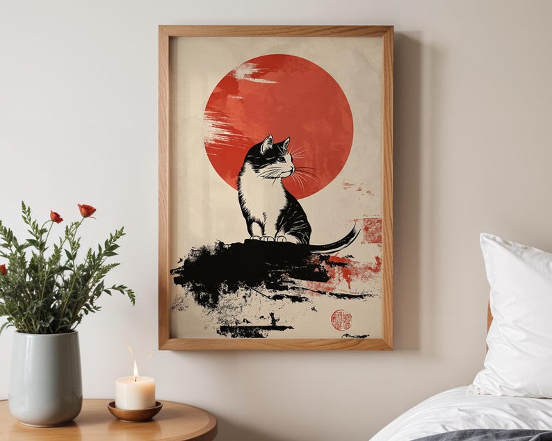 May include: A black and white illustration of a cat sitting on a rock with a large red sun behind it. The image is in a minimalist style with a Japanese aesthetic.