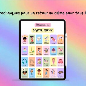 May include: A black tablet displays a colorful card set with illustrations and text in French. The text at the top reads "24 techniques pour un retour au calme pour tous âges". The tablet is held with a white stylus against a pastel rainbow background.