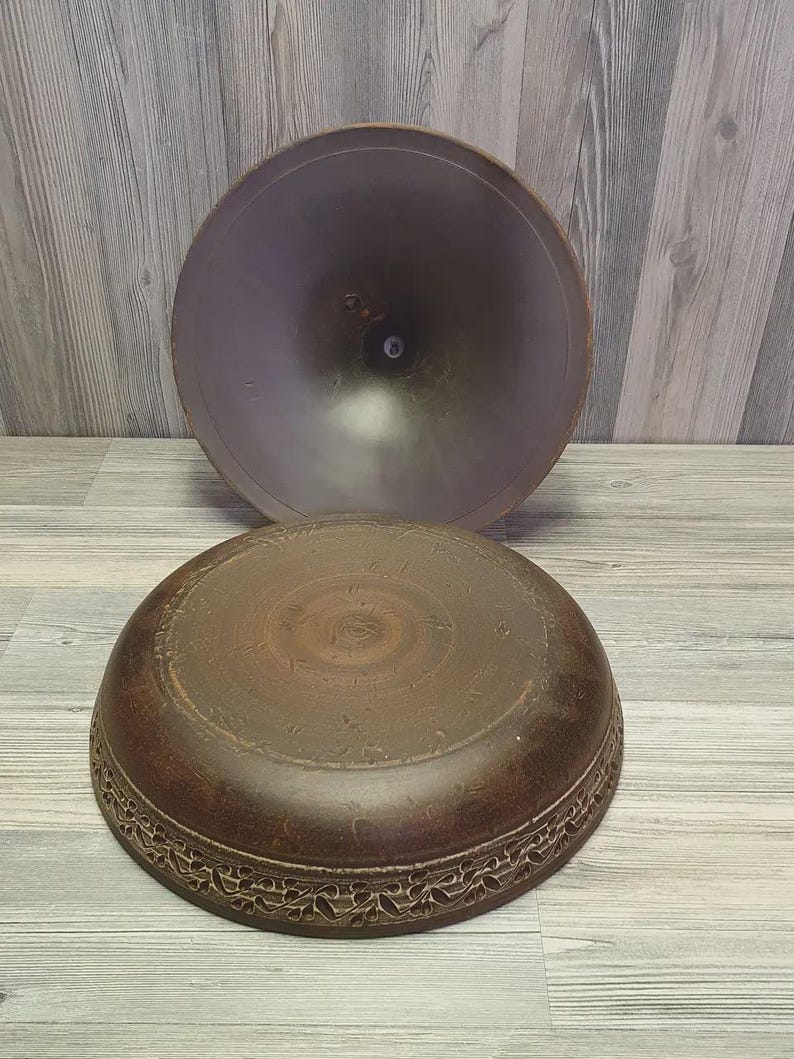 Handmade red clay tagine dish with lid for oven cooking