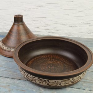 Inside view of handmade clay tagine pot