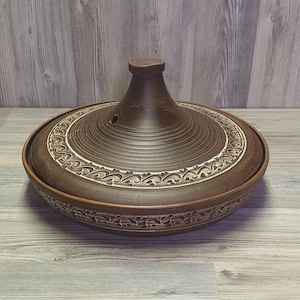 Moroccan-style clay pot with conical lid for roasting